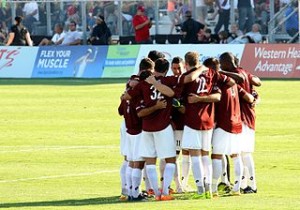 Sac Republic huddle prior to the second half of a friendly match against Atlas of Mexico. Photo by Splitfire1000